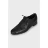Lace-up shoes with perforation