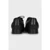 Lace-up shoes with perforation