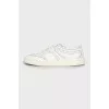 Leather sneakers with weave