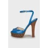 Leather sandals with printed soles