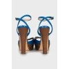 Leather sandals with printed soles