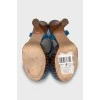 Leather sandals with printed soles