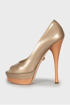 Gold patent leather shoes