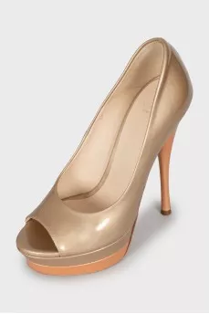 Gold patent leather shoes