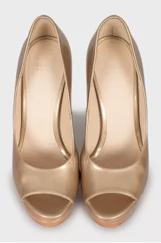 Gold patent leather shoes