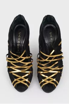 Sucks with golden leather weave