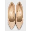 Suede shoes with a figured cutout