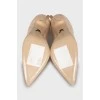 Suede shoes with a figured cutout