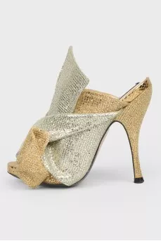 Open socks and silver bow with tag