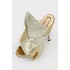 Open socks and silver bow with tag