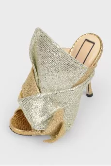 Open socks and silver bow with tag