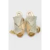 Open socks and silver bow with tag