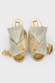 Open socks and silver bow with tag