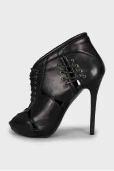 Lace-up ankle boots with figured cutouts
