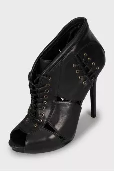 Lace-up ankle boots with figured cutouts