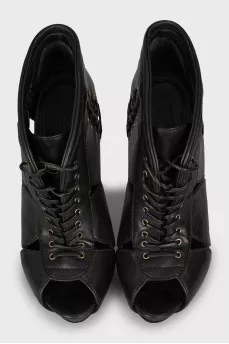 Lace-up ankle boots with figured cutouts