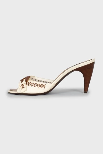 Mules with decorative embroidery