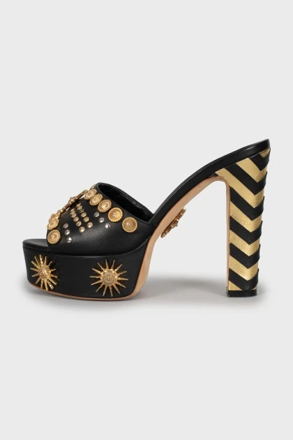 Leather mules with gold-tone heel decor