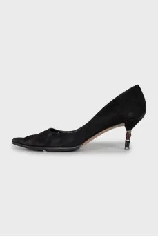 Suede pumps with a figured heel