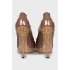 Beige leather high heel shoes