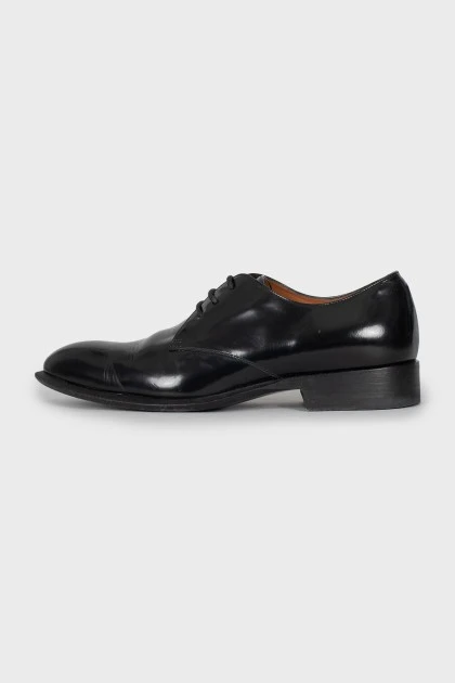 Black leather shoes with almond toe
