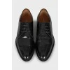 Black leather shoes with almond toe