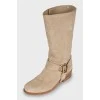 Suede boots with branded decor