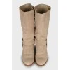 Suede boots with branded decor