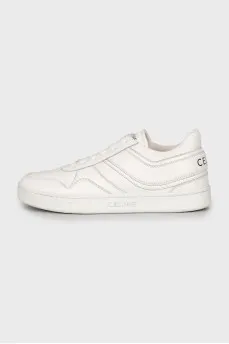 White leather sneakers with logo