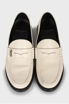 White leather loafers
