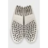 White leather moccasins