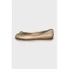 Golden leather ballet flats