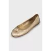 Golden leather ballet flats