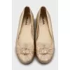 Golden leather ballet flats