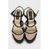 Suede sandals decorated with beads