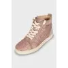 High top sneakers decorated with rhinestones