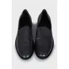 Men's black leather loafers