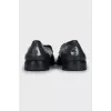 Men's black leather loafers