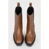 Brown Chelsea on a black sole with a tag