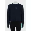 Jumper with branded embroidery and tag