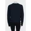 Jumper with branded embroidery and tag
