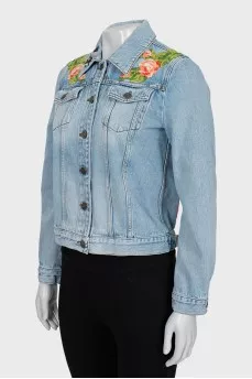 Denim jacket decorated with embroidery
