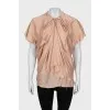 Silk blouse with raw edge