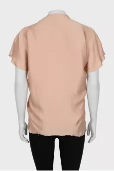 Silk blouse with raw edge