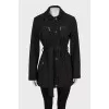 Jacket with a belt, buttons and a zipper