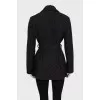 Jacket with a belt, buttons and a zipper