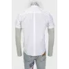 Shirt with embroidery on the pocket and collar