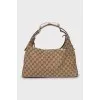 Shoulder bag in signature print