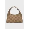 Shoulder bag in signature print
