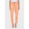 Peach drawstring trousers